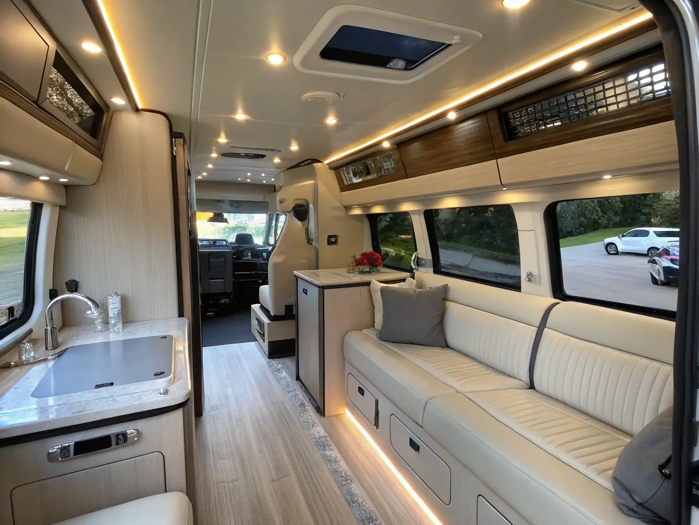 An image of a modern van interior featuring smart security devices, modular furniture setups, and energy management systems, showcasing the integration of innovative solutions for a seamless van life experience.